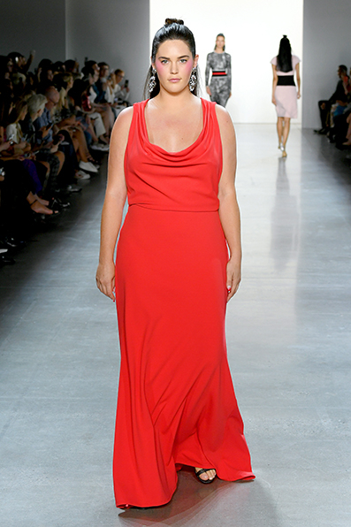 CARMINE TEXTURED CREPE SLEEVELESS COWL NECK GOWN WITH CROSS BACK AND DRAPING DETAIL