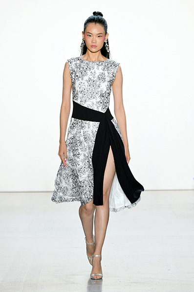 BLACK/ IVORY BLOOM EMBROIDERED TULLE SLEEVELESS DRESS WITH TEXTURED CREPE WAIST SASH DETAIL